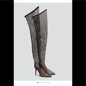 Thigh high fishnet boots